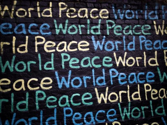 world peace written on a wall